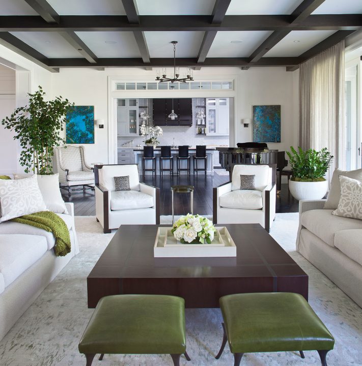 Adam Hunter designed living room with pops of green color and neutral textures.