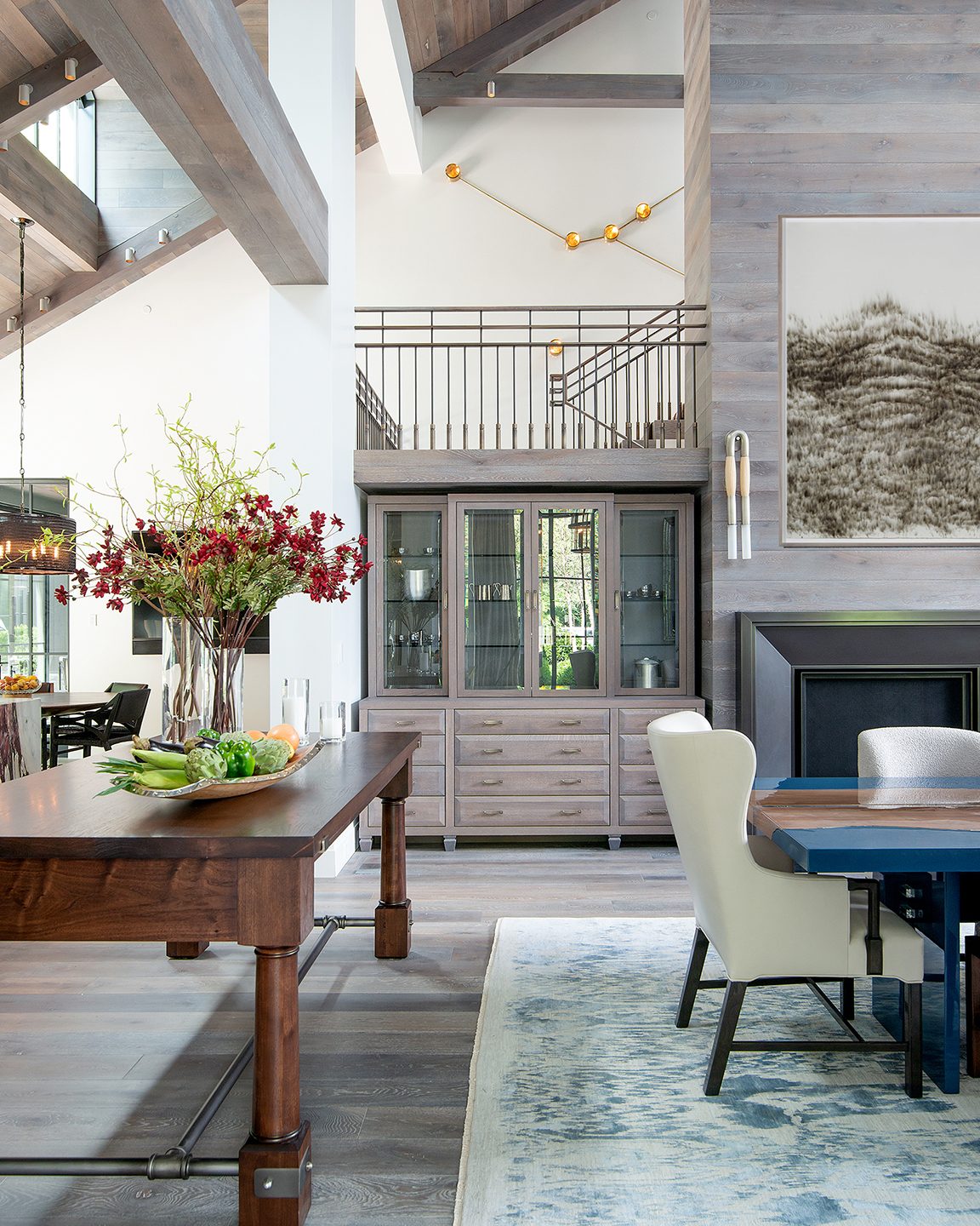 Adam Hunter designed dining room with tall ceilings.