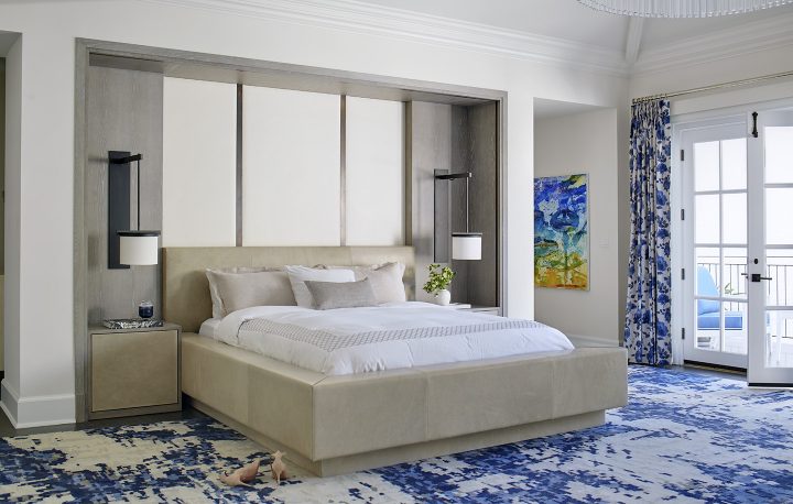 Adam Hunter designed bedroom with a built-in bed and sconces.