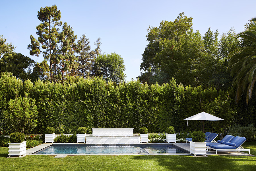 Adam Hunter designed backyard in brentwood park featuring a pool.