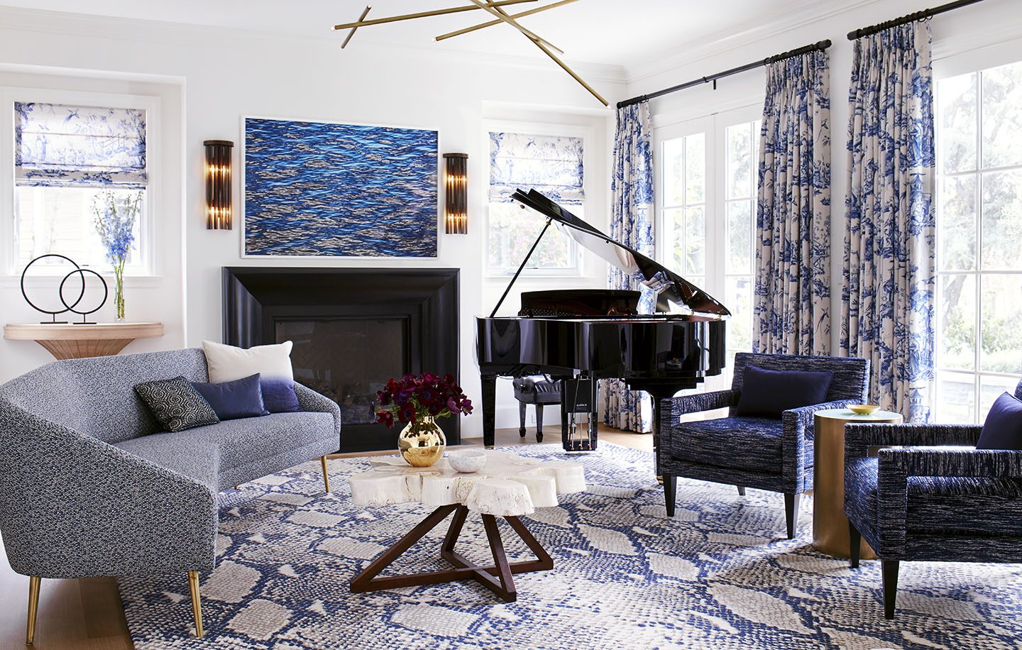 Adam Hunter designed living room with a DVF rug and piano.