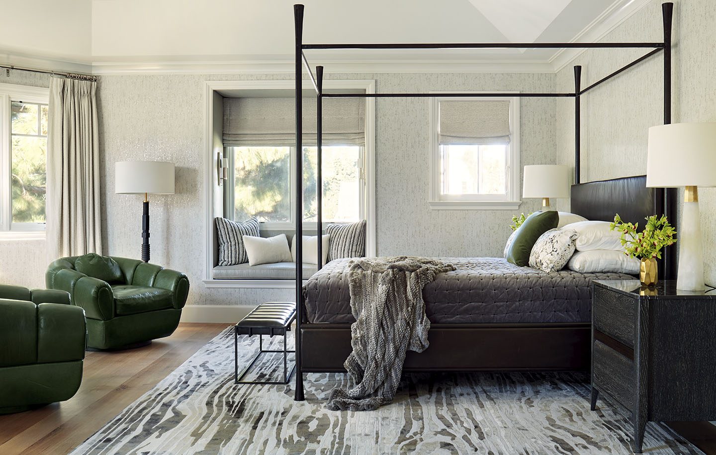 Adam Hunter designed master bedroom with his Zebois rug and green accents.